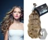 Világos göndör erősen hullámos európai szőke póthaj hajkereskedés Nadabán Hair Budapest